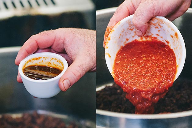 Mix through beef jus, before adding crushed tomatoes