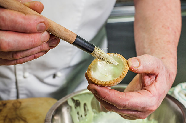 Lining the shells with white chocolate