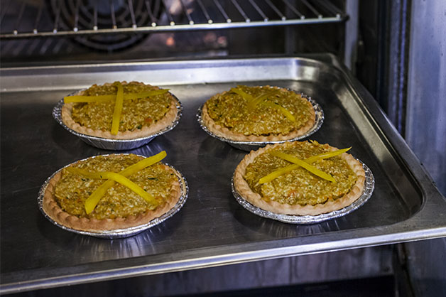 Putting tartlets into the oven