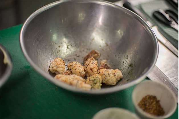 Tossing the squid with spices