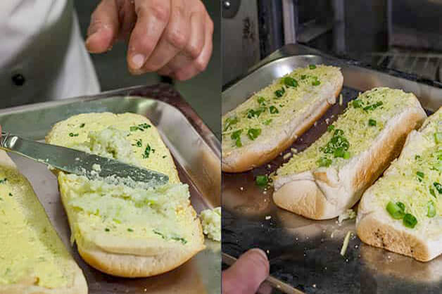 Spread being placed on garlic bread