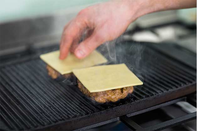 Image of the cheese melting on the beef