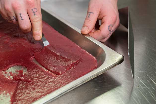 Chef cutting out circles of the jelly