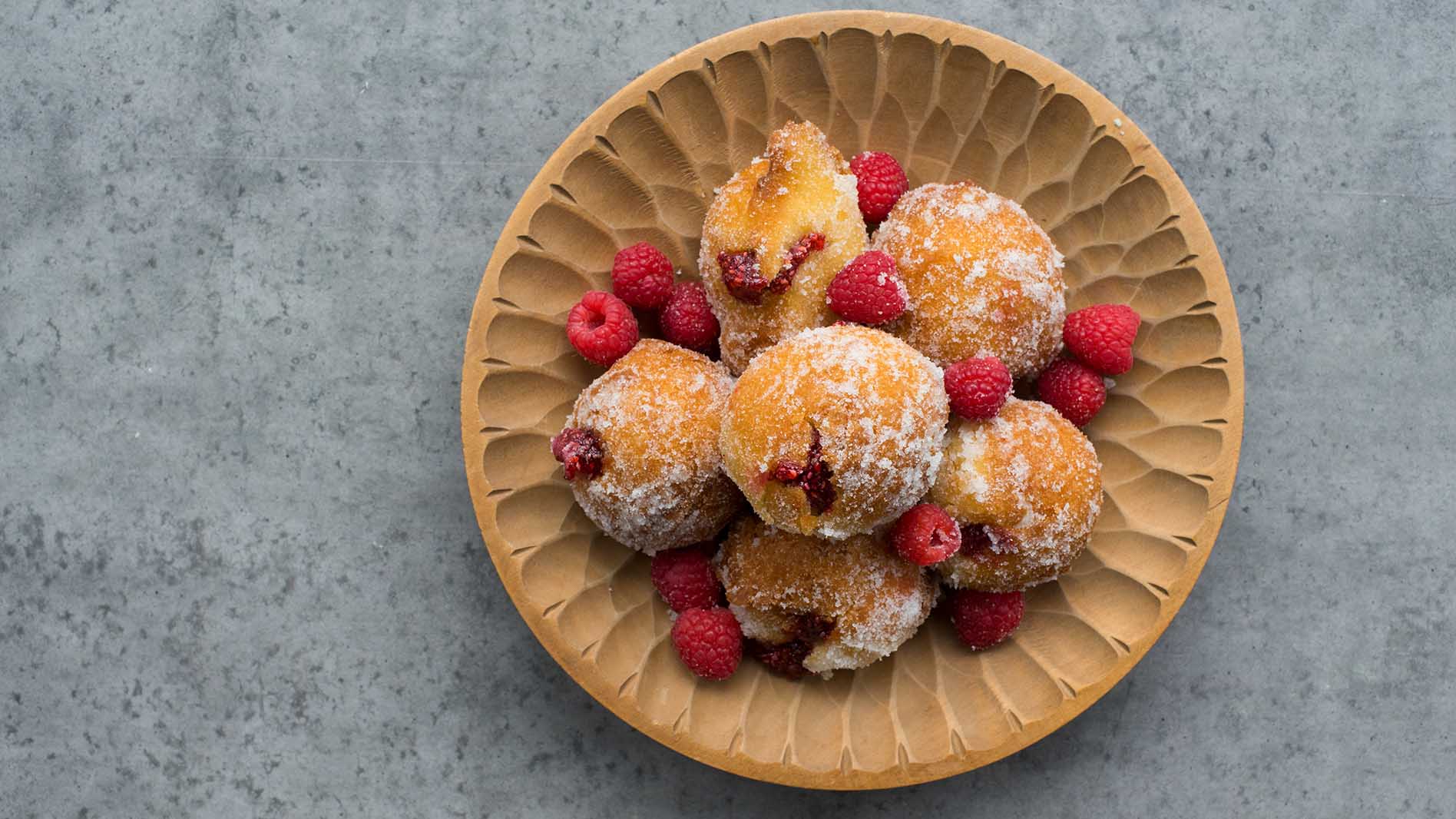 Hot raspberry jam filled donuts