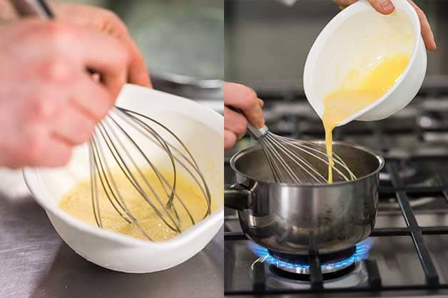 Chef whisking the custarf