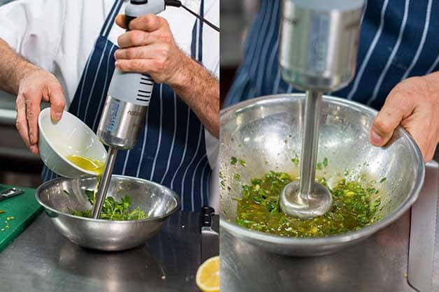 In this photo, the chef is blitzing the ingredients for the dressing