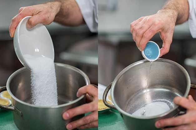 The chef is combining ingredients for the lemon curd