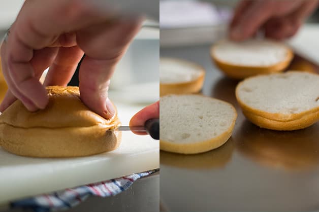 The chef is pictured slicing the Helgas' Gluten-Free Rolls in half
