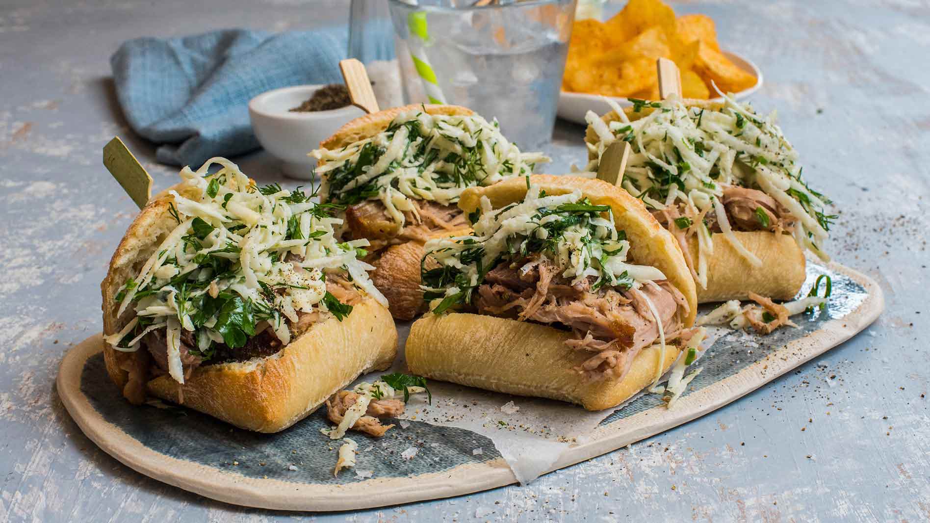 Slow-cooked pork & fennel, celeriac salad on QBA Ciabatta Rolls