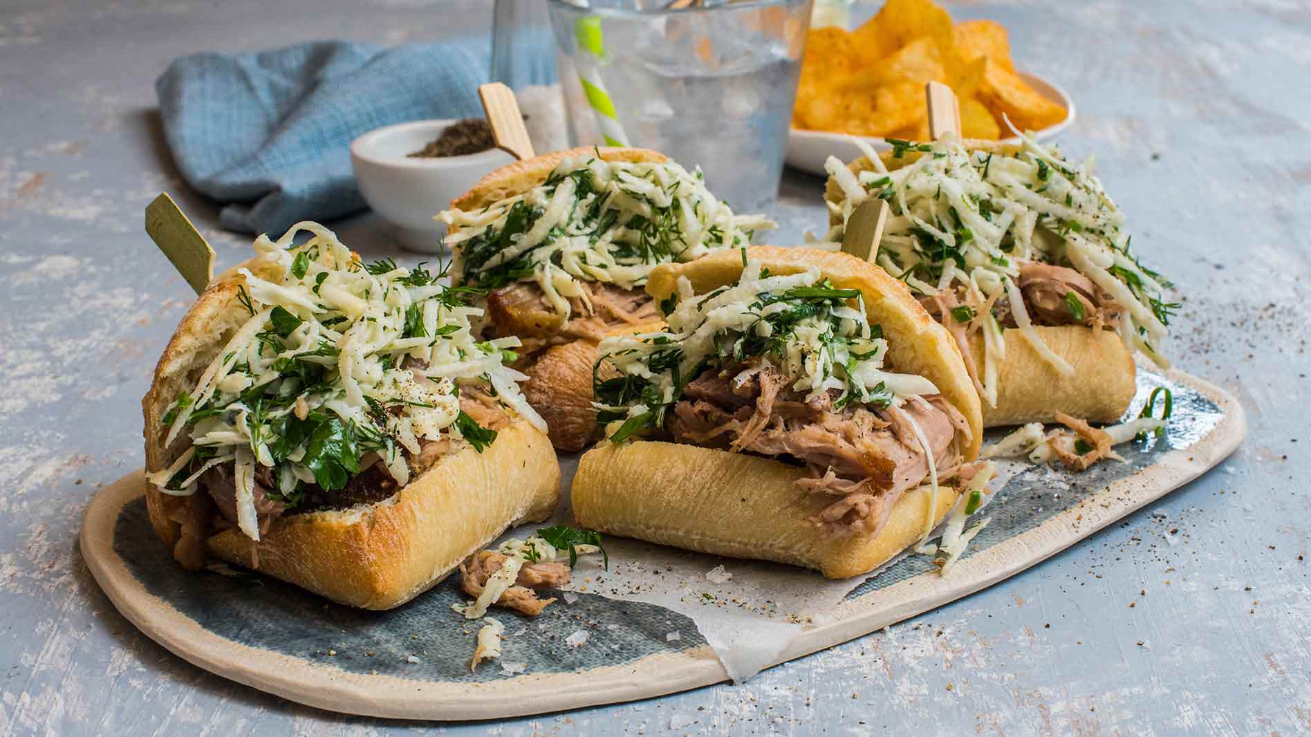 Slow-cooked pork & fennel, celeriac salad on QBA Ciabatta Rolls