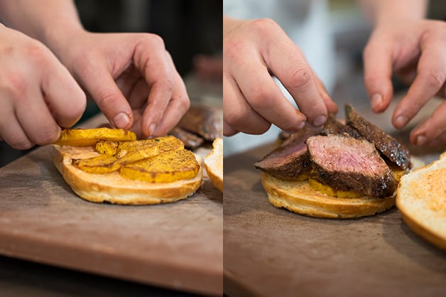 The chef is seen adding the pumpkin and lamb to the bread