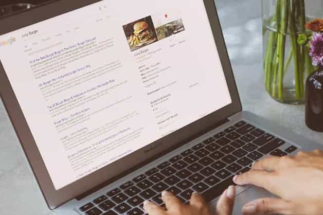 The lady is seen publishing an online advertisement on her laptop