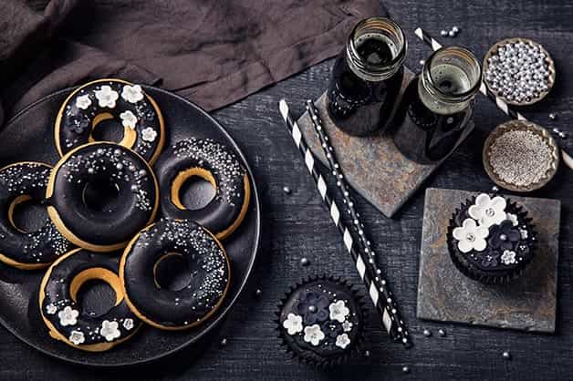 The image is of charcoal donuts