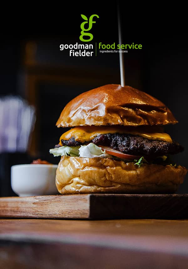 Poster of gourmet burger on a breadboard