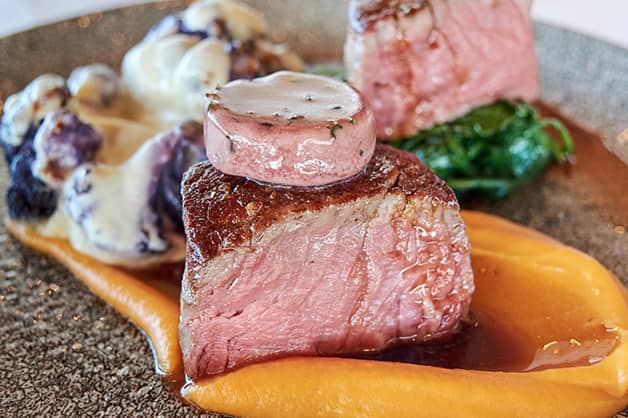 Image of Bellarine Beef eye fillet, sweet potato puree, cheesy cauliflower, spinach, Jack Rabbit shiraz butter, red wine jus GF