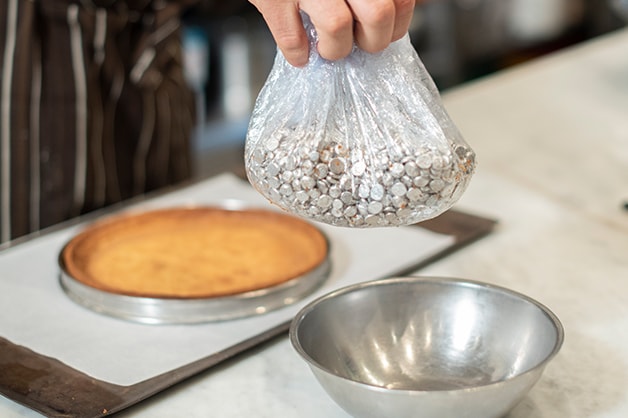 Chef Stone uses metal beans for blind baking
