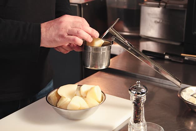 Image of the chef creating mash potato