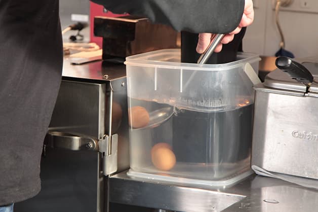 Chef is pictured making the 63 degree eggs