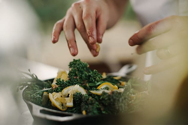 Image of a chef using vegetables