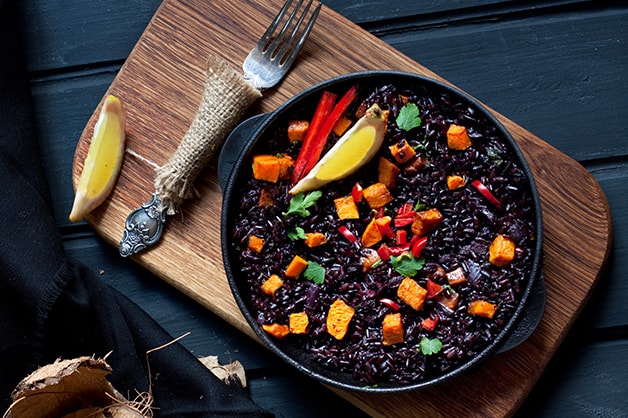 A black rice dish is pictured