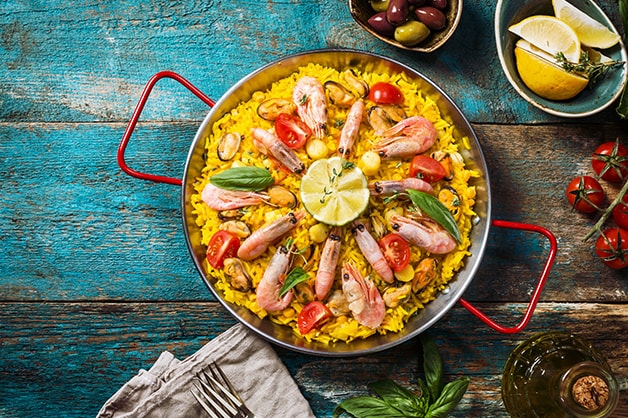 Paella is pictured in this image