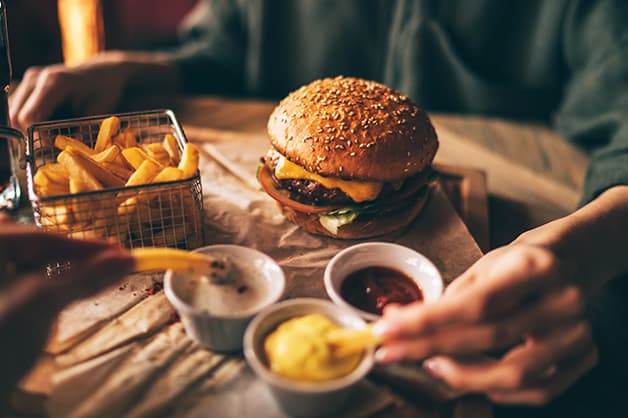 Burger with three sauces and fries