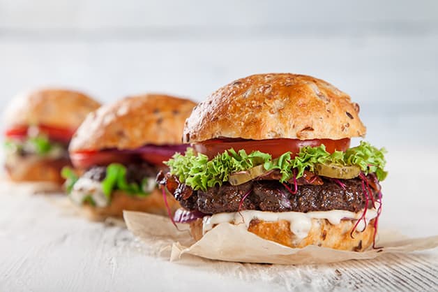 Image of three burgers in a line