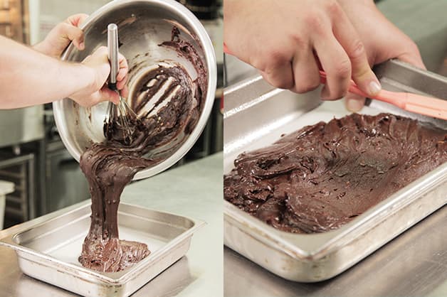 Pouring brownie mixture into the tray