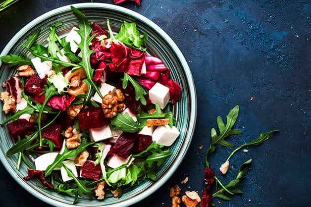 Oil being used as a dressing for salads