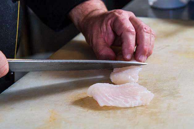 Cut fish into portions