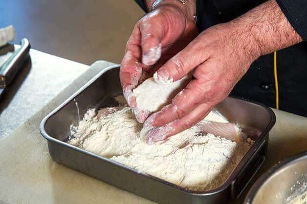 Lightly flour fish fillets